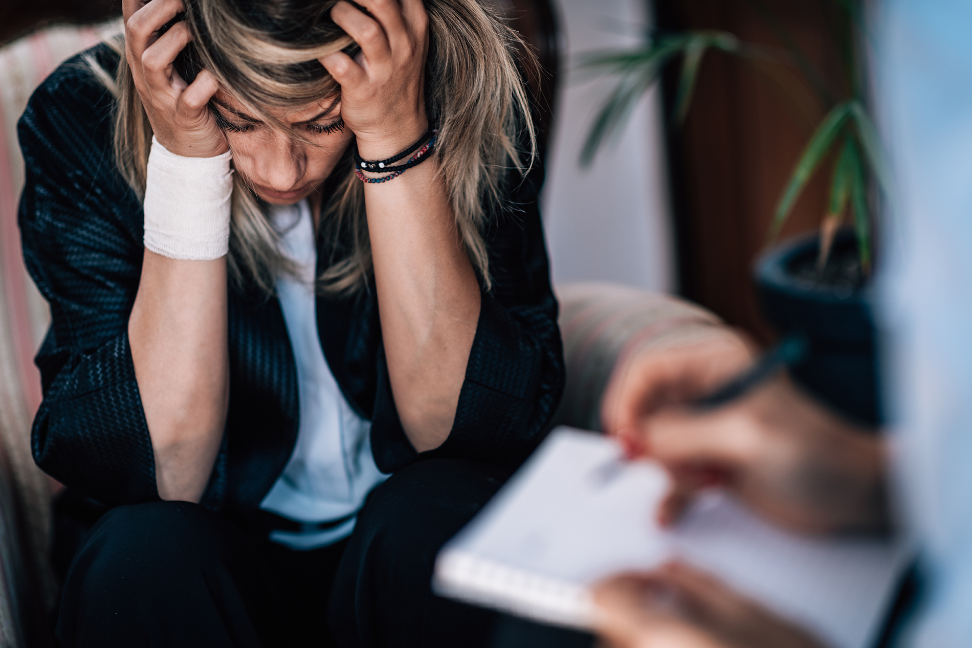 Deppression Concept - Suicidal Female Patient in Psychotherapy Session